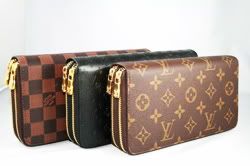 Louis Vuitton 2 Zipped Wallet