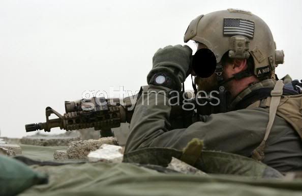 USNavySeallookstowardsinsurgentmove.jpg