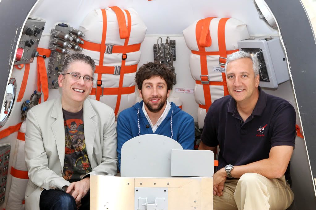 “The Big Bang Theory” co-creator/executive producer Bill Prady, series star Simon Helberg (who plays Howard Wolowitz) and guest star/NASA Astronaut Mike Massimino sit in the replica Soyuz Capsule built for the season finale of “The Big Bang Theory” (airing Thursday, May 10, at 8/7c on CBS), currently on display at the Paley Center for Media in Beverly Hills, California, as part of Warner Bros. Television Group’s Television: Out of the Box exhibit. (Photo Credit: © Warner Bros. Entertainment Inc.)