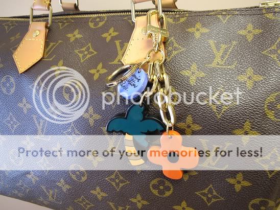 Authentic Louis Vuitton Ailleurs City Palm Tree Key Chain and Bag 